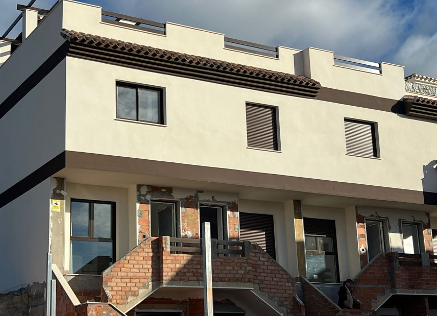 Nybyggeri - terraced -
Portmán